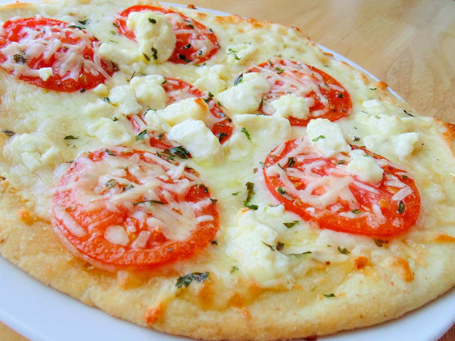 This Four Cheese Margherita Pizza is a wonderful twist on a beloved classic. The blend of cheeses adds depth and richness, making each bite a delightful experience.