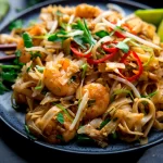 thai prawn noodles in bowl, homemade prawn noodles, thai seafood noodles, prawn stir fry noodles, spicy thai noodles, noodles with prawns, asian prawn noodles, easy thai noodle recipe